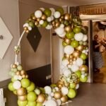 Organic style Hoop in Fiona Green Mirror Gold and Standard White latex balloons .Balloon Flower balloons detail .